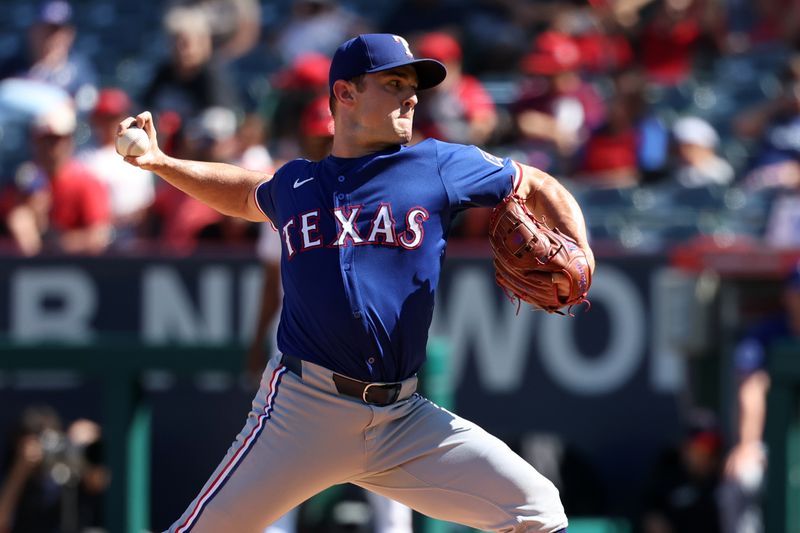 Sep 29, 2024; Anaheim, California, USA;  Texas Rangers relief pitcher David Robertson (37) pitches during the ninth inning against the Los Angeles Angels at Angel Stadium. Mandatory Credit: Kiyoshi Mio-Imagn Images