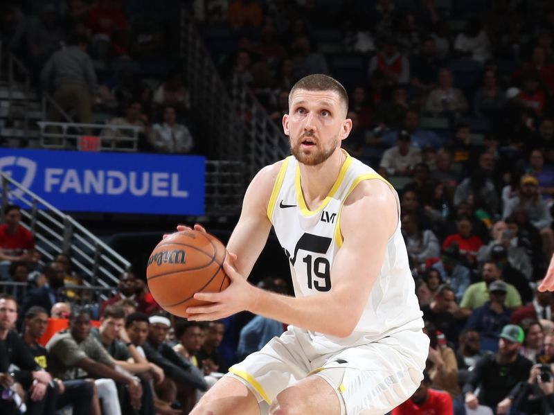 NEW ORLEANS, LA - JANUARY 17:  Svi Mykhailiuk #19 of the Utah Jazz handles the ball during the game against the New Orleans Pelicans on January 17, 2025 at the Smoothie King Center in New Orleans, Louisiana. NOTE TO USER: User expressly acknowledges and agrees that, by downloading and or using this Photograph, user is consenting to the terms and conditions of the Getty Images License Agreement. Mandatory Copyright Notice: Copyright 2025 NBAE (Photo by Layne Murdoch Jr./NBAE via Getty Images)