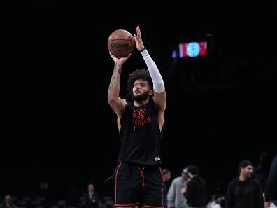 BROOKLYN, NY - DECEMBER 23: Isaiah Livers #12 of the Detroit Pistons warms up before the game against the Brooklyn Nets on December 23, 2023 at Barclays Center in Brooklyn, New York. NOTE TO USER: User expressly acknowledges and agrees that, by downloading and or using this Photograph, user is consenting to the terms and conditions of the Getty Images License Agreement. Mandatory Copyright Notice: Copyright 2023 NBAE (Photo by Jesse D. Garrabrant/NBAE via Getty Images)