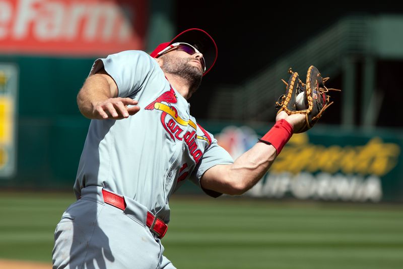 Apr 17, 2024; Oakland, California, USA; St. Louis Cardinals first baseman Paul Goldschmidt (46) makes an over-the-shoulder catch of a foul popup off the bat of Oakland Athletics designated hitter Abraham Toro (not pictured) during the third inning at Oakland-Alameda County Coliseum. Mandatory Credit: D. Ross Cameron-USA TODAY Sports