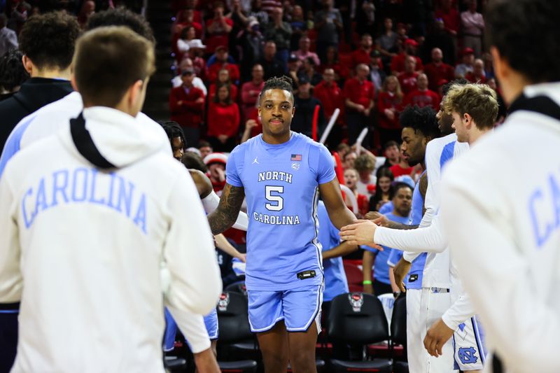 Feb 19, 2023; Raleigh, North Carolina, USA;  North Carolina Tar Heels forward Armando Bacot (5) walks out before the first half of the game against North Carolina State Wolfpack at PNC Arena. Mandatory Credit: Jaylynn Nash-USA TODAY Sports