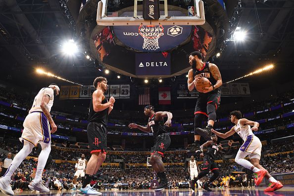 LOS ANGELES, CA - DECEMBER 2:  Fred VanVleet #5 of the Houston Rockets grabs the rebound during the game  on December 2, 2023 at Crypto.Com Arena in Los Angeles, California. NOTE TO USER: User expressly acknowledges and agrees that, by downloading and/or using this Photograph, user is consenting to the terms and conditions of the Getty Images License Agreement. Mandatory Copyright Notice: Copyright 2023 NBAE (Photo by Adam Pantozzi/NBAE via Getty Images)