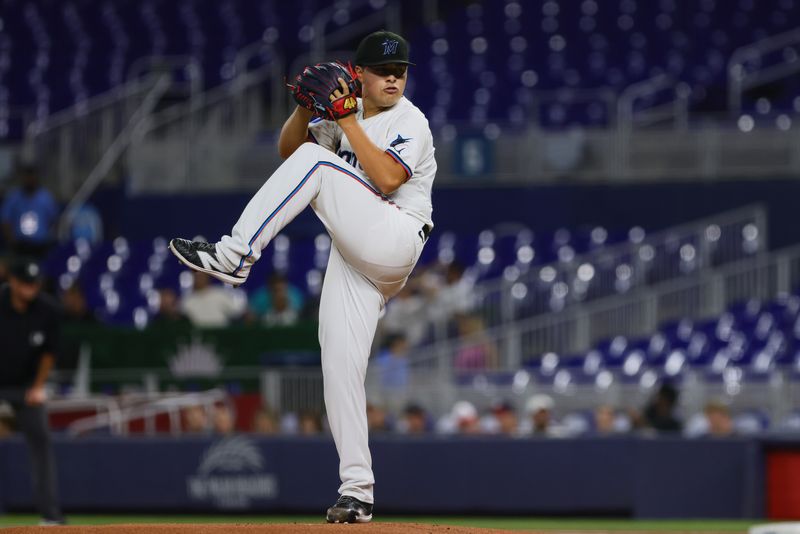 Sep 4, 2024; Miami, Florida, USA; Miami Marlins starting pitcher Valente Bellozo (83) delivers a pitch against the Washington Nationals during the first inning at loanDepot Park. Mandatory Credit: Sam Navarro-Imagn Images