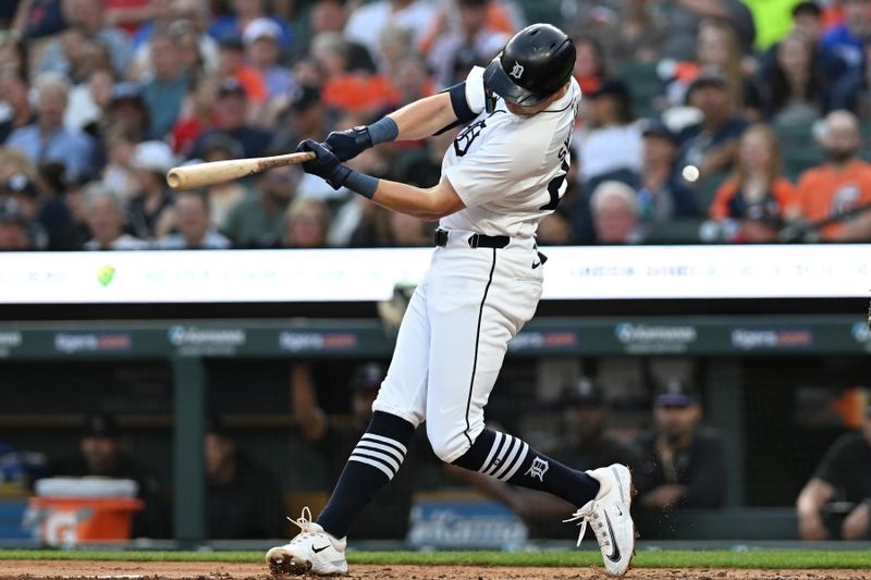 Sep 11, 2024; Detroit, Michigan, USA; Detroit Tigers shortstop Trey Sweeney (27) hits a home run against the Colorado Rockies in the first inning at Comerica Park. Mandatory Credit: Lon Horwedel-Imagn Images