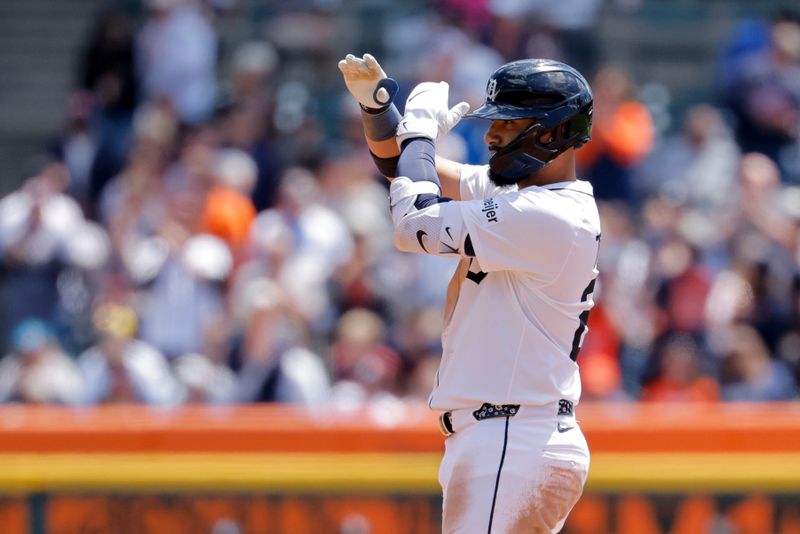 May 25, 2025; Detroit, Michigan, USA;  Detroit Tigers outfielder Javier Báez (28) celebrates after he hits a double in the fourth inning against the Cleveland Guardians at Comerica Park. Mandatory Credit: Rick Osentoski-Imagn Images