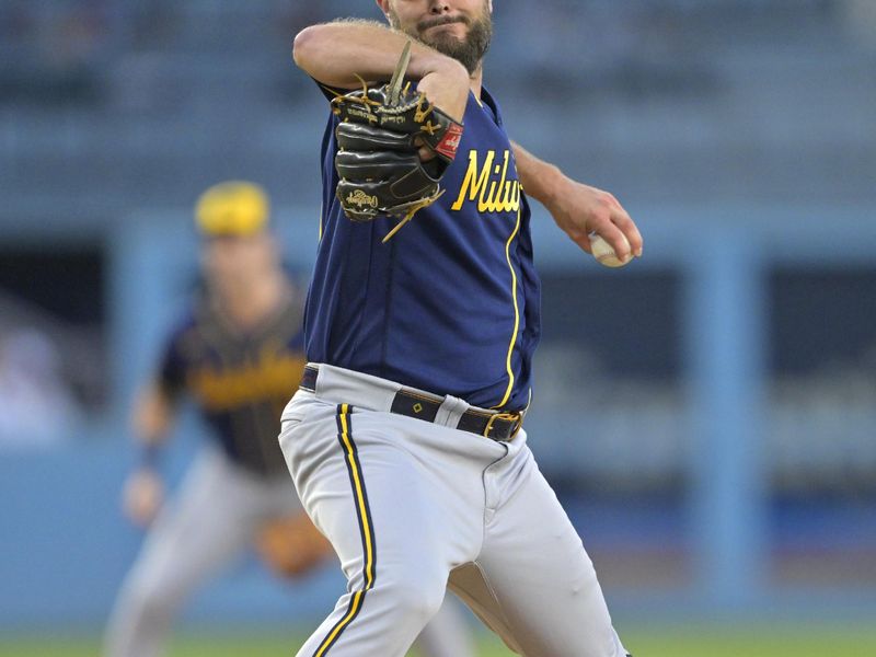 Aug 16, 2023; Los Angeles, California, USA;  Milwaukee Brewers starting pitcher Wade Miley (20) throws to the plate in the first inning against the Los Angeles Dodgers at Dodger Stadium. Mandatory Credit: Jayne Kamin-Oncea-USA TODAY Sports