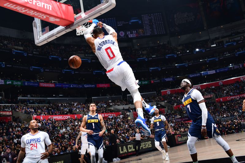 LOS ANGELES, CA - APRIL 4: Russell Westbrook #0 of the LA Clippers dunks the ball during the game against the Denver Nuggets on April 4, 2024 at Crypto.Com Arena in Los Angeles, California. NOTE TO USER: User expressly acknowledges and agrees that, by downloading and/or using this Photograph, user is consenting to the terms and conditions of the Getty Images License Agreement. Mandatory Copyright Notice: Copyright 2024 NBAE (Photo by Adam Pantozzi/NBAE via Getty Images)