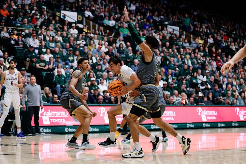 Feb 9, 2024; Fort Collins, Colorado, USA; San Jose State Spartans guard Alvaro Cardenas (13) drives to the net as Colorado State Rams guard Josiah Strong (3) guards in the first half at Moby Arena. Mandatory Credit: Isaiah J. Downing-USA TODAY Sports