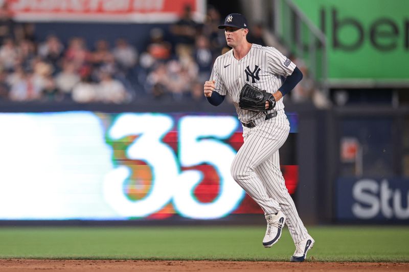 Jun 18, 2024; Bronx, New York, USA; New York Yankees relief pitcher Clay Holmes (35) enters the game during the ninth inning against the Baltimore Orioles at Yankee Stadium. Mandatory Credit: Vincent Carchietta-USA TODAY Sports