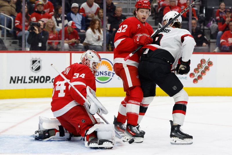 Jan 7, 2025; Detroit, Michigan, USA; Detroit Red Wings goaltender Alex Lyon (34) makes a save in the first period against the Ottawa Senators at Little Caesars Arena. Mandatory Credit: Rick Osentoski-Imagn Images