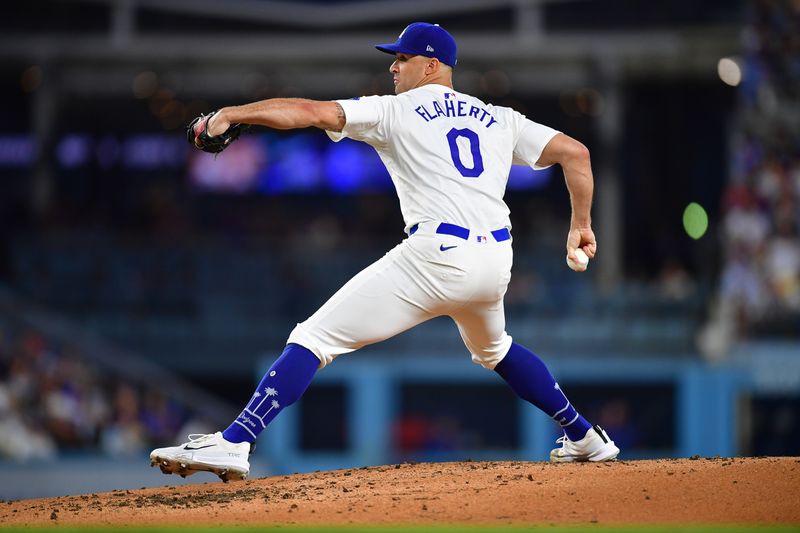 Aug 27, 2024; Los Angeles, California, USA; Los Angeles Dodgers pitcher Jack Flaherty (0) throws against the Baltimore Orioles during the third inning at Dodger Stadium. Mandatory Credit: Gary A. Vasquez-USA TODAY Sports