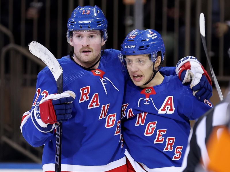 Mar 26, 2024; New York, New York, USA; New York Rangers left wing Alexis Lafreniere (13) celebrates his goal against the Philadelphia Flyers with left wing Artemi Panarin (10) during the third period at Madison Square Garden. Mandatory Credit: Brad Penner-USA TODAY Sports