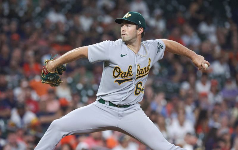 Sep 11, 2023; Houston, Texas, USA; Oakland Athletics starting pitcher Ken Waldichuk (64) delivers a pitch during the sixth inning against the Houston Astros at Minute Maid Park. Mandatory Credit: Troy Taormina-USA TODAY Sports