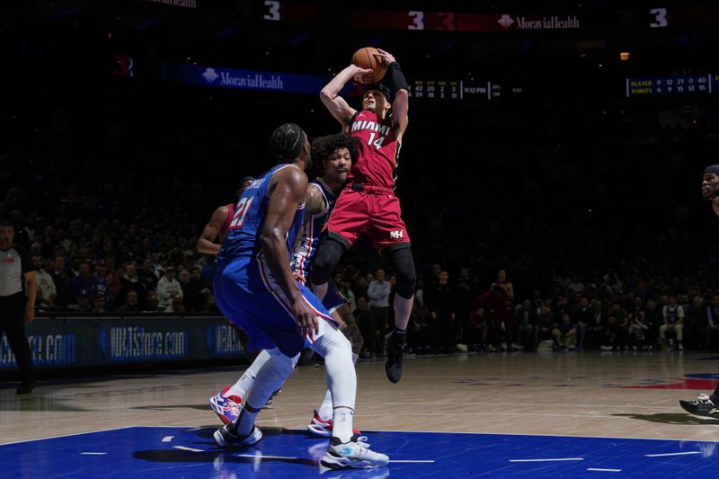 PHILADELPHIA, PA - APRIL 17: Tyler Herro #14 of the Miami Heat shoots the ball during the game against the Philadelphia 76ers during the 2024 NBA Play-In Tournament on April 17, 2024 at the Wells Fargo Center in Philadelphia, Pennsylvania NOTE TO USER: User expressly acknowledges and agrees that, by downloading and/or using this Photograph, user is consenting to the terms and conditions of the Getty Images License Agreement. Mandatory Copyright Notice: Copyright 2024 NBAE (Photo by Jesse D. Garrabrant/NBAE via Getty Images)