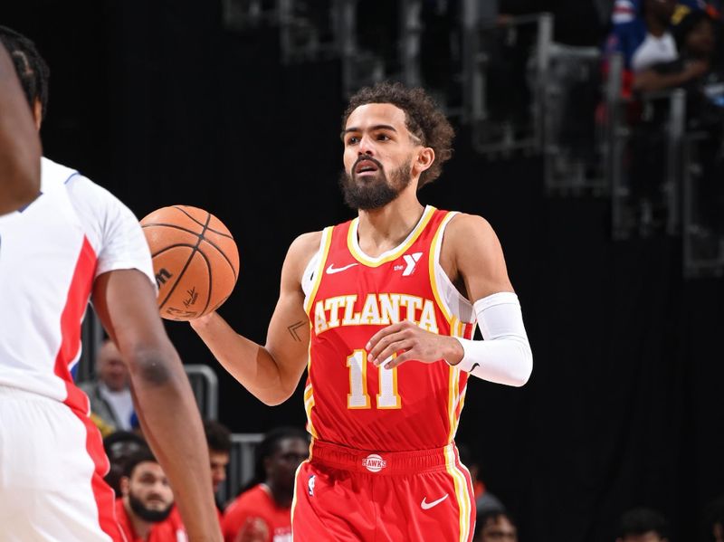 DETROIT, MI - FEBRUARY 3:  Trae Young #11 of the Atlanta Hawks dribbles the ball during the game against the Detroit Pistons on February 3, 2025 at Little Caesars Arena in Detroit, Michigan. NOTE TO USER: User expressly acknowledges and agrees that, by downloading and/or using this photograph, User is consenting to the terms and conditions of the Getty Images License Agreement. Mandatory Copyright Notice: Copyright 2025 NBAE (Photo by Chris Schwegler/NBAE via Getty Images)