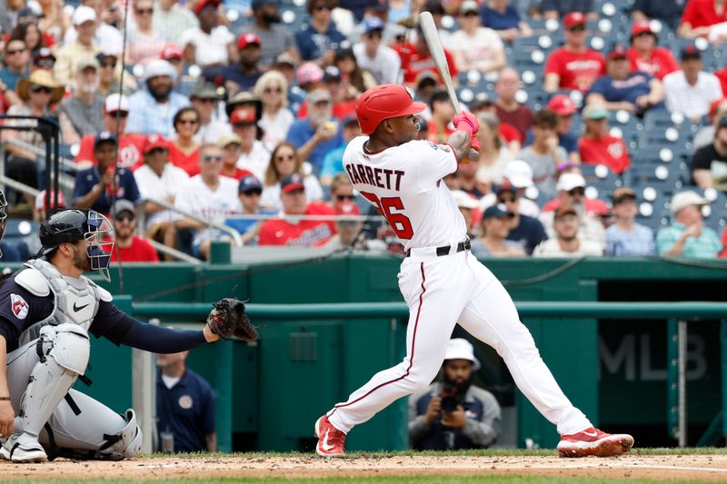 Apr 16, 2023; Washington, District of Columbia, USA; Washington Nationals left fielder Stone Garrett (36) hits a double against the Cleveland Guardians during the second inning at Nationals Park. Mandatory Credit: Geoff Burke-USA TODAY Sports