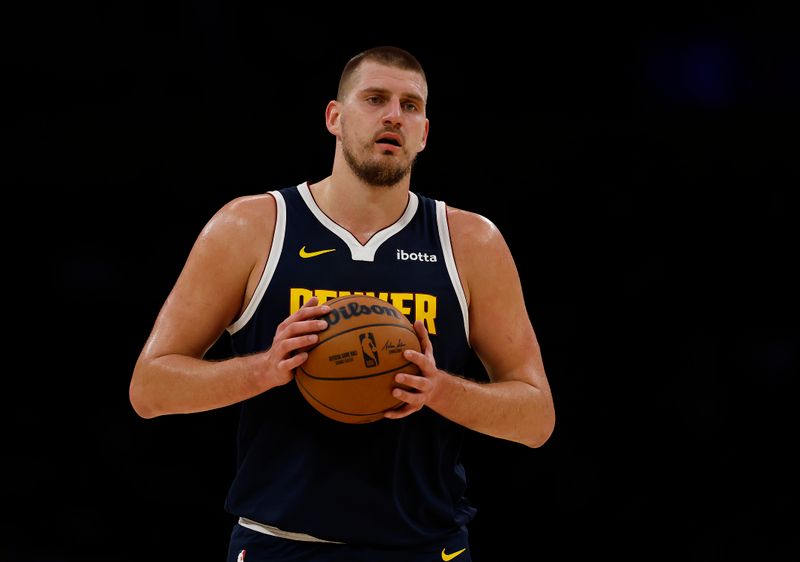 LOS ANGELES, CALIFORNIA - NOVEMBER 23:  Nikola Jokic #15 of the Denver Nuggets in the first half at Crypto.com Arena on November 23, 2024 in Los Angeles, California.  NOTE TO USER: User expressly acknowledges and agrees that, by downloading and/or using this photograph, user is consenting to the terms and conditions of the Getty Images License Agreement. (Photo by Ronald Martinez/Getty Images)