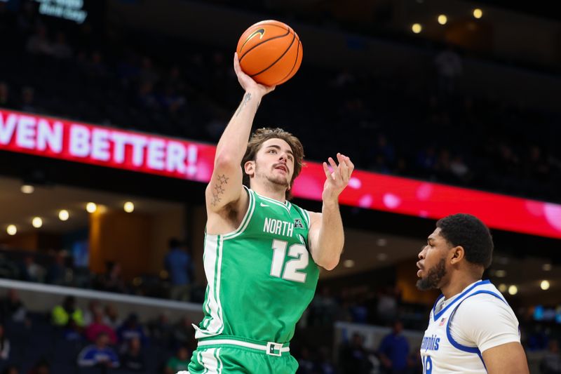 Dec 31, 2025; Memphis, Tennessee, USA; North Texas Mean Green forward Dylan Arnett (12) shoots the ball against the Memphis Tigers during the second half at FedExForum. Mandatory Credit: Wesley Hale-Imagn Images