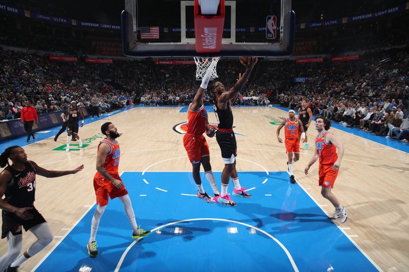 OKLAHOMA CITY, OK - JANUARY 23: Scoot Henderson #00 of the Portland Trail Blazers shoots the ball during the game against the Oklahoma City Thunder on January 23, 2024 at Paycom Arena in Oklahoma City, Oklahoma. NOTE TO USER: User expressly acknowledges and agrees that, by downloading and or using this photograph, User is consenting to the terms and conditions of the Getty Images License Agreement. Mandatory Copyright Notice: Copyright 2024 NBAE (Photo by Zach Beeker/NBAE via Getty Images)