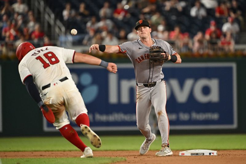 Aug 6, 2024; Washington, District of Columbia, USA; San Francisco Giants short stop Tyler Fitzgerald (49) throws the ball to first base in front of Washington Nationals first baseman Juan Yepez (18) during the seventh inning at Nationals Park. Mandatory Credit: Rafael Suanes-USA TODAY Sports