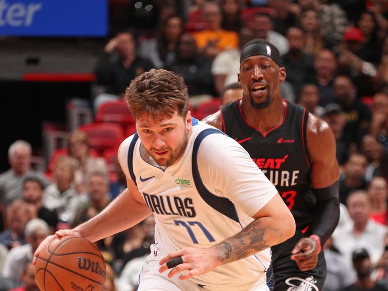 MIAMI, FL - APRIL 10: Luka Doncic #77 of the Dallas Mavericks dribbles the ball during the game against the Miami Heat on April 10, 2024 at Kaseya Center in Miami, Florida. NOTE TO USER: User expressly acknowledges and agrees that, by downloading and or using this Photograph, user is consenting to the terms and conditions of the Getty Images License Agreement. Mandatory Copyright Notice: Copyright 2024 NBAE (Photo by Issac Baldizon/NBAE via Getty Images)