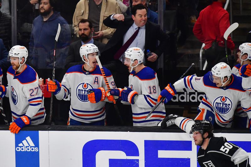 Apr 29, 2023; Los Angeles, California, USA; Edmonton Oilers head coach Jay Woodcroft and the bench celebrate the victory against the Los Angeles Kings in game six of the first round of the 2023 Stanley Cup Playoffs at Crypto.com Arena. Mandatory Credit: Gary A. Vasquez-USA TODAY Sports