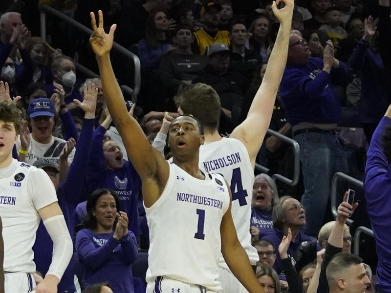 Feb 19, 2023; Evanston, Illinois, USA; Northwestern Wildcats guard Chase Audige (1) celebrates a three point basket against the Iowa Hawkeyes during the second half at Welsh-Ryan Arena. Mandatory Credit: David Banks-USA TODAY Sports