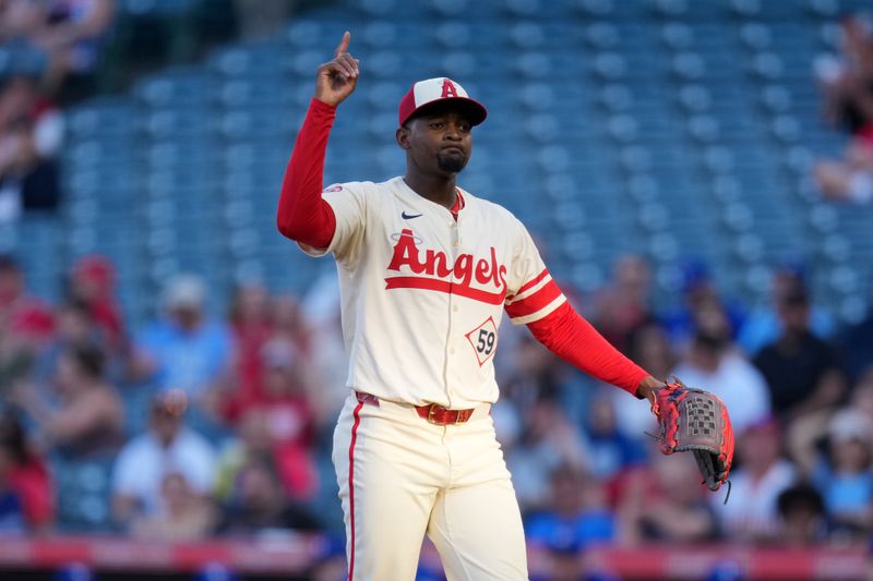 May 8, 2025; Anaheim, California, USA; Los Angeles Angels starting pitcher Jose Soriano (59) gestures at the end of the first inning against the Toronto Blue Jays at Angel Stadium. Mandatory Credit: Kirby Lee-Imagn Images