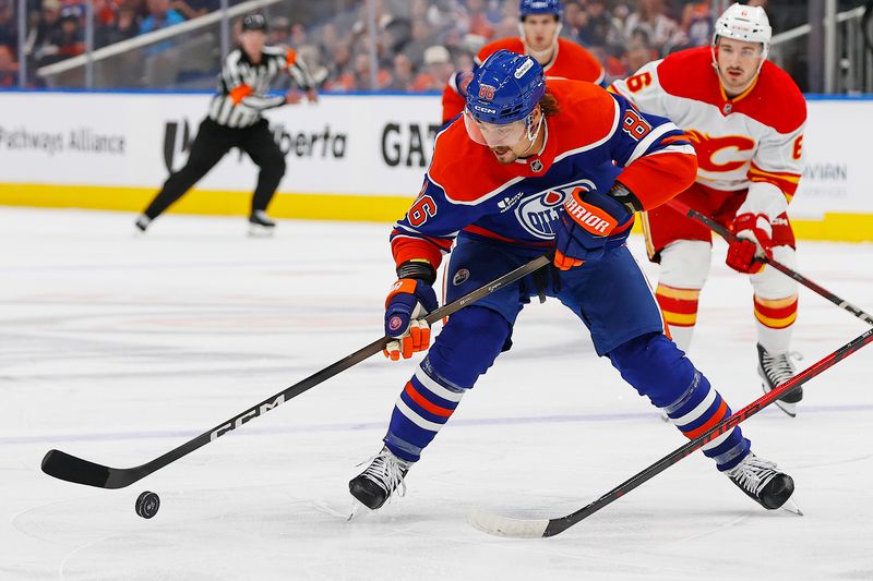 Sep 21, 2025; Edmonton, Alberta, CAN; Edmonton Oilers forward David Tomasek (86) takes a shot in front of Calgary Flames forward Rory Kerins (6) during the first period at Rogers Place. Mandatory Credit: Perry Nelson-Imagn Images