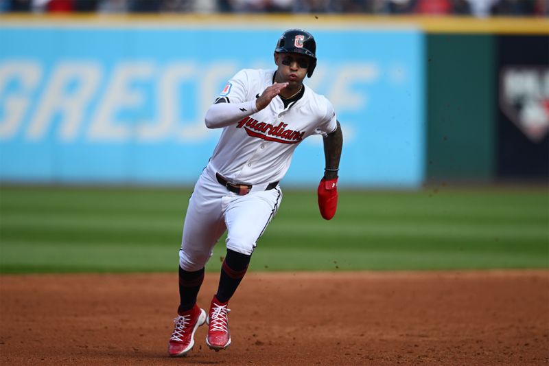 Oct 12, 2024; Cleveland, Ohio, USA; Cleveland Guardians shortstop Brayan Rocchio (4) advances to third base in the third inning against the Detroit Tigers during game five of the ALDS for the 2024 MLB Playoffs at Progressive Field. Mandatory Credit: Ken Blaze-Imagn Images