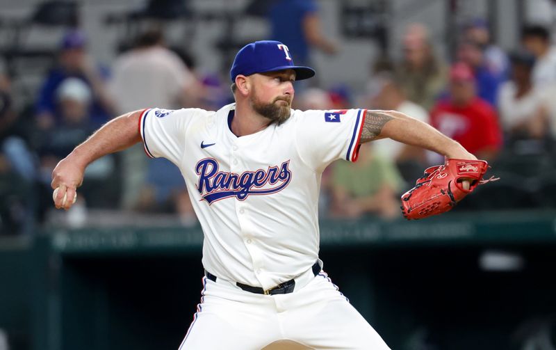 Sep 18, 2024; Arlington, Texas, USA;  Texas Rangers relief pitcher Kirby Yates (39) throws during the ninth inning against the Toronto Blue Jays at Globe Life Field. Mandatory Credit: Kevin Jairaj-Imagn Images