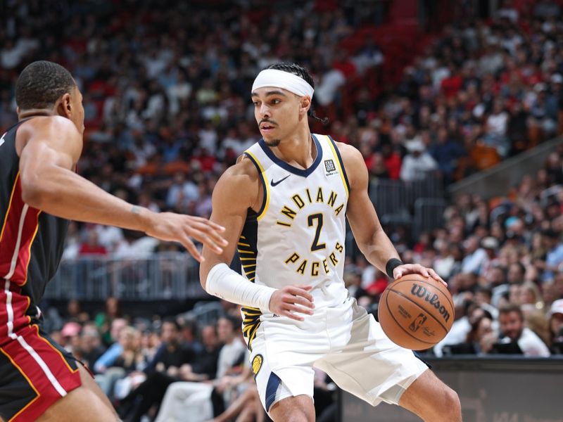 MIAMI, FL - JANUARY 02: Andrew Nembhard #2 of the Indiana Pacers dribbles the ball during the game against the Miami Heat on January 02, 2024 at Kaseya Center in Miami, Florida. NOTE TO USER: User expressly acknowledges and agrees that, by downloading and or using this Photograph, user is consenting to the terms and conditions of the Getty Images License Agreement. Mandatory Copyright Notice: Copyright 2024 NBAE (Photo by Jeff Haynes/NBAE via Getty Images)