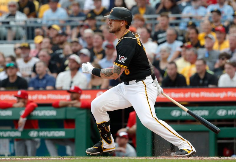 Jul 23, 2024; Pittsburgh, Pennsylvania, USA;  Pittsburgh Pirates catcher Yasmani Grandal (6) hits a single against the St. Louis Cardinals during the second inning at PNC Park. Mandatory Credit: Charles LeClaire-USA TODAY Sports