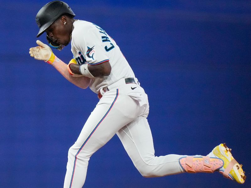 Sep 17, 2023; Miami, Florida, USA; Miami Marlins center fielder Jazz Chisholm Jr. (2) celebrates after hitting a grand slam against the Atlanta Braves during the third inning at loanDepot Park. Mandatory Credit: Rich Storry-USA TODAY Sports