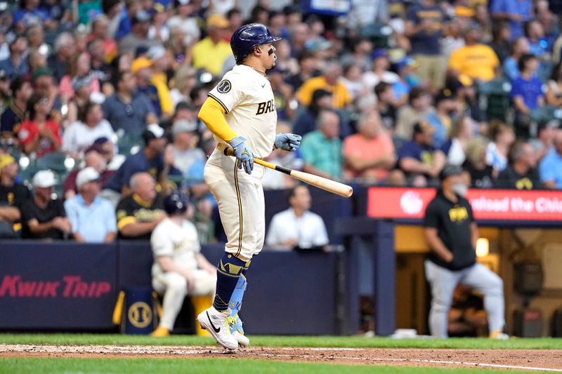 Jul 10, 2024; Milwaukee, Wisconsin, USA;  Milwaukee Brewers catcher William Contreras (24) watches his RBI double during the fourth inning against the Pittsburgh Pirates at American Family Field. Mandatory Credit: Jeff Hanisch-USA TODAY Sports