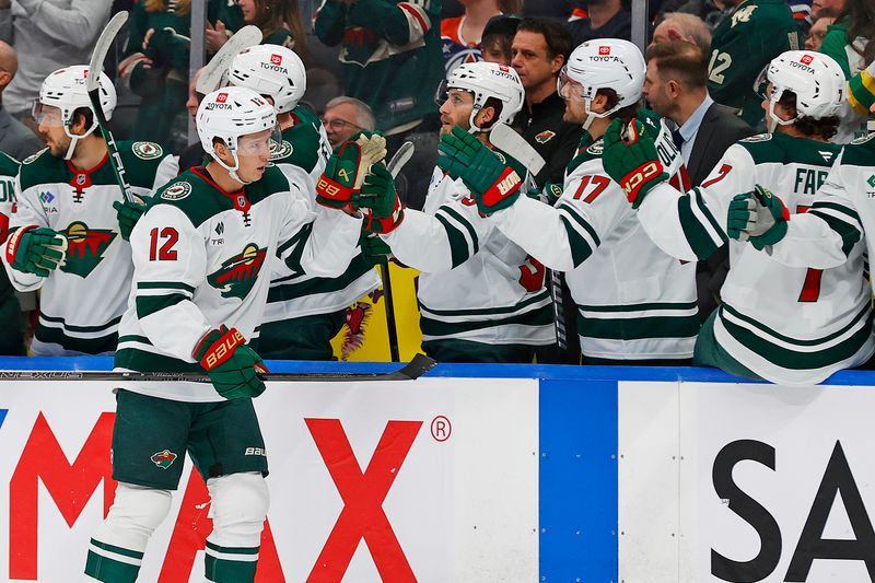 Nov 21, 2024; Edmonton, Alberta, CAN; The Minnesota Wild celebrate a goal scored by forward Matt Boldy (12) during the first period against the Edmonton Oilers at Rogers Place. Mandatory Credit: Perry Nelson-Imagn Images