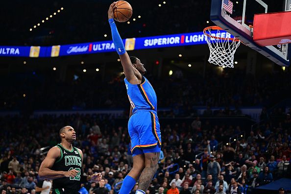 OKLAHOMA CITY, OKLAHOMA - JANUARY 2: Jalen Williams #8 of the Oklahoma City Thunder rises up for a dunk during the second half against the Boston Celtics at Paycom Center on January 2, 2024 in Oklahoma City, Oklahoma. NOTE TO USER: User expressly acknowledges and agrees that, by downloading and or using this Photograph, user is consenting to the terms and conditions of the Getty Images License Agreement. (Photo by Joshua Gateley/Getty Images)