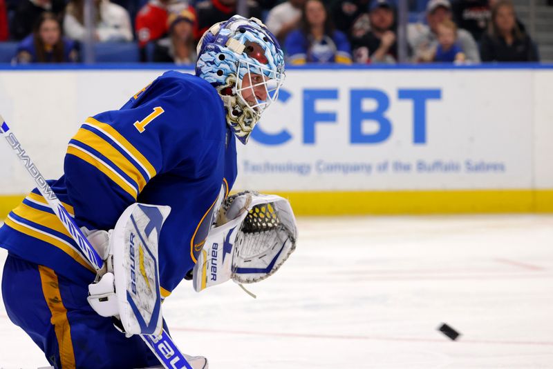 Nov 5, 2024; Buffalo, New York, USA;  Buffalo Sabres goaltender Ukko-Pekka Luukkonen (1) looks to make a save during the third period against the Ottawa Senators at KeyBank Center. Mandatory Credit: Timothy T. Ludwig-Imagn Images