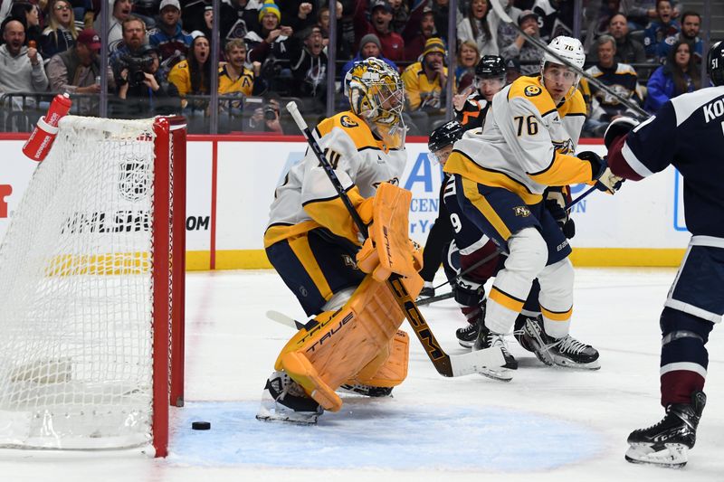 Nov 11, 2024; Denver, Colorado, USA; Nashville Predators goaltender Juuse Saros (74) reacts after allowing a goal during the second period during the second period against the Colorado Avalanche at Ball Arena. Mandatory Credit: Christopher Hanewinckel-Imagn Images