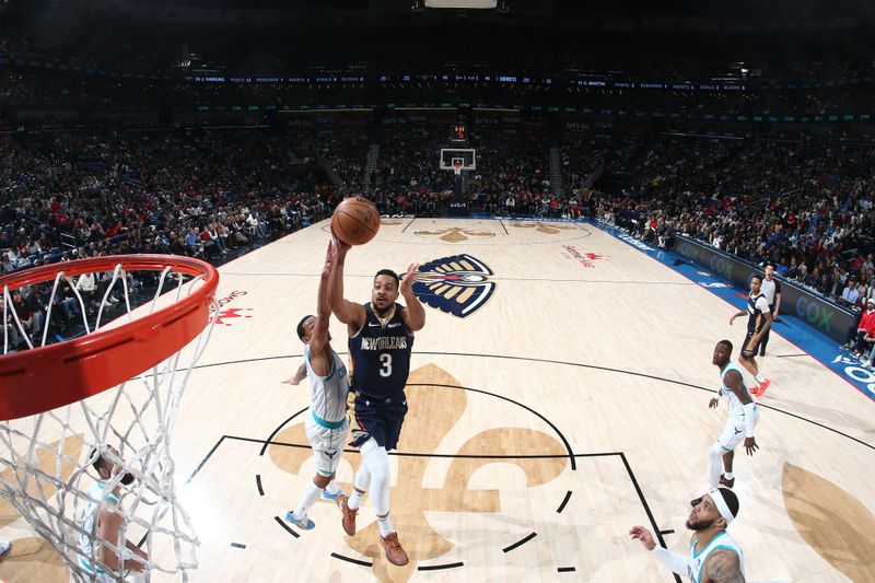 NEW ORLEANS, LA - JANUARY 17: CJ McCollum #3 of the New Orleans Pelicans shoots the ball during the game against the Charlotte Hornets on January 17, 2024 at the Smoothie King Center in New Orleans, Louisiana. NOTE TO USER: User expressly acknowledges and agrees that, by downloading and or using this Photograph, user is consenting to the terms and conditions of the Getty Images License Agreement. Mandatory Copyright Notice: Copyright 2024 NBAE (Photo by Layne Murdoch Jr./NBAE via Getty Images)