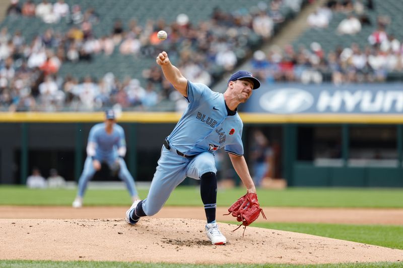 May 27, 2024; Chicago, Illinois, USA; Toronto Blue Jays starting pitcher Chris Bassitt (40) delivers a pitch against the Chicago White Sox during the first inning at Guaranteed Rate Field. Mandatory Credit: Kamil Krzaczynski-USA TODAY Sports