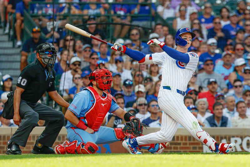 Sep 27, 2025; Chicago, Illinois, USA; Chicago Cubs center fielder Pete Crow-Armstrong (4) hits a two-run home run against the St. Louis Cardinals during the eight inning at Wrigley Field. Mandatory Credit: Kamil Krzaczynski-Imagn Images