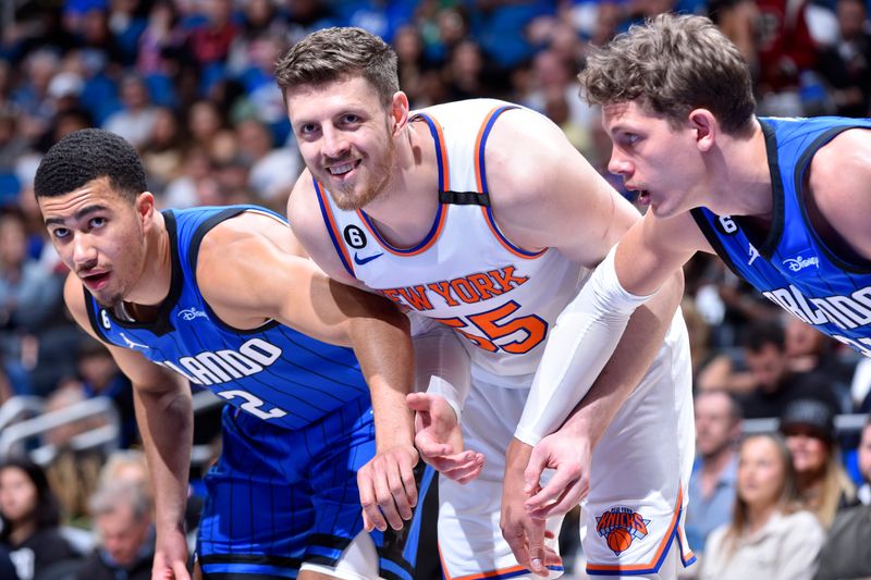 ORLANDO, FL - MARCH 23: Isaiah Hartenstein #55 of the New York Knicks looks on during the game against the Orlando Magic on March 23, 2023 at Amway Center in Orlando, Florida. NOTE TO USER: User expressly acknowledges and agrees that, by downloading and or using this photograph, User is consenting to the terms and conditions of the Getty Images License Agreement. Mandatory Copyright Notice: Copyright 2023 NBAE (Photo by Gary Bassing/NBAE via Getty Images)