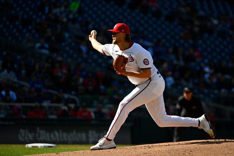 Apr 9, 2025; Washington, District of Columbia, USA; Washington Nationals pitcher Jake Irvin (27) throws to the Los Angeles Dodgers during the first inning at Nationals Park. Mandatory Credit: Brad Mills-Imagn Images