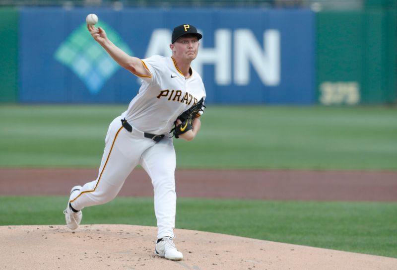 Aug 26, 2024; Pittsburgh, Pennsylvania, USA;  Pittsburgh Pirates starting pitcher Mitch Keller (23) delivers a pitch against the Chicago Cubs during the first inning at PNC Park. Mandatory Credit: Charles LeClaire-USA TODAY Sports