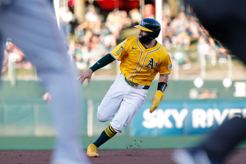 May 20, 2025; West Sacramento, California, USA; Athletics catcher Shea Langeliers (23) advances to third base during the second inning against the Los Angeles Angels at Sutter Health Park. Mandatory Credit: Sergio Estrada-Imagn Images