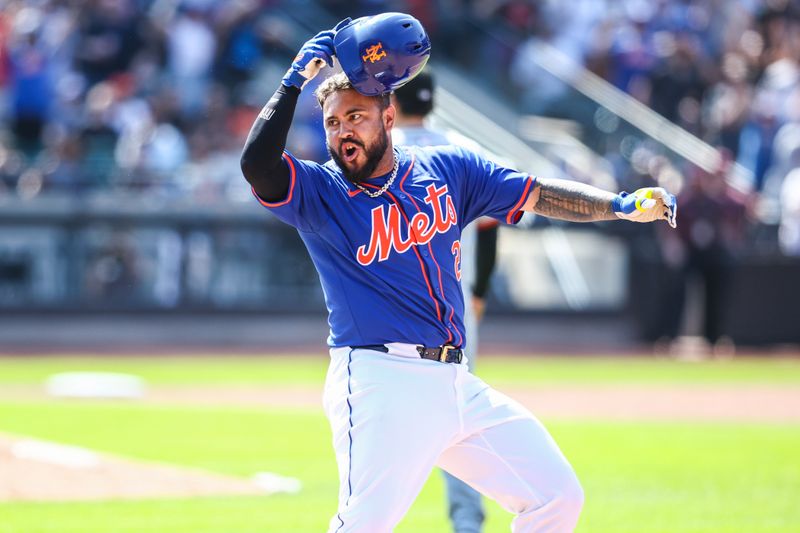 May 26, 2024; New York City, New York, USA;  New York Mets catcher Omar Narváez (2) hits a game winning RBI single to defeat the San Francisco Giants 4-3 at Citi Field. Mandatory Credit: Wendell Cruz-USA TODAY Sports