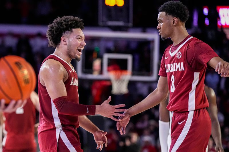 Jan 31, 2024; Athens, Georgia, USA; Alabama Crimson Tide guards Mark Sears (1) and Rylan Griffen (3) react after a comeback win against the Georgia Bulldogs at Stegeman Coliseum. Mandatory Credit: Dale Zanine-USA TODAY Sports