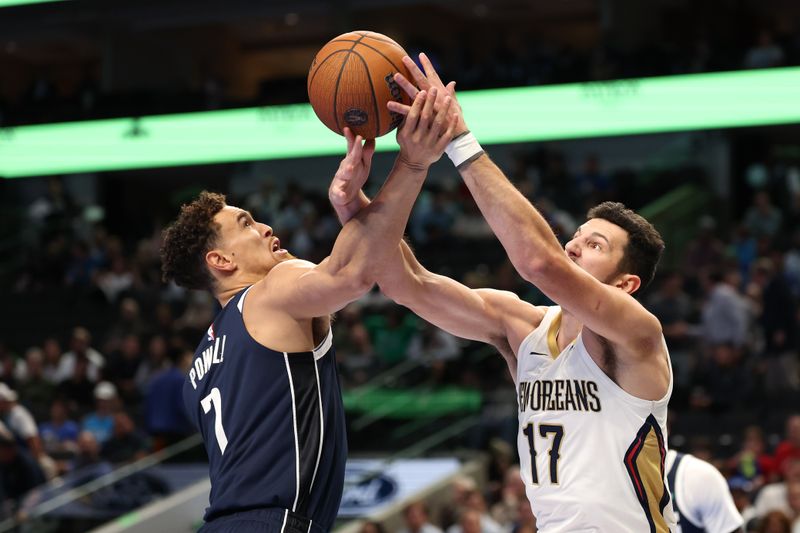 DALLAS, TEXAS - NOVEMBER 19: Karlo Matkovic #17 of the New Orleans Pelicans and Dwight Powell #7 of the Dallas Mavericks compete for a loose ball during the second half of an Emirates NBA Cup game at American Airlines Center on November 19, 2024 in Dallas, Texas. NOTE TO USER: User expressly acknowledges and agrees that, by downloading and/or using this photograph, user is consenting to the terms and conditions of the Getty Images License Agreement. (Photo by Sam Hodde/Getty Images)