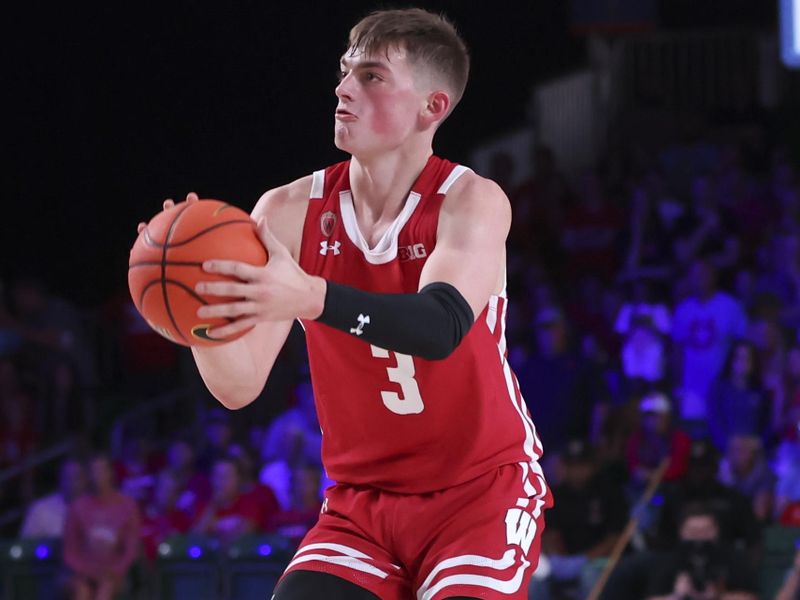 Nov 23, 2022; Paradise Island, BAHAMAS; Wisconsin Badgers guard Connor Essegian (3) shoots during the second half against the Dayton Flyers at Imperial Arena. Mandatory Credit: Kevin Jairaj-USA TODAY Sports